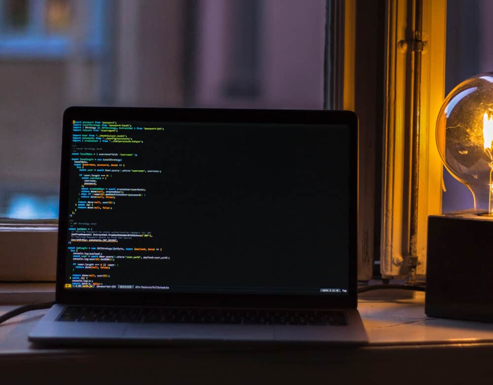 Laptop on desk with light