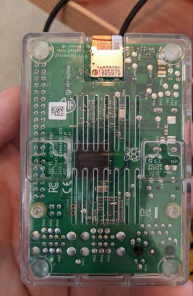 Raspberry Pi circuit board held in someone's hand