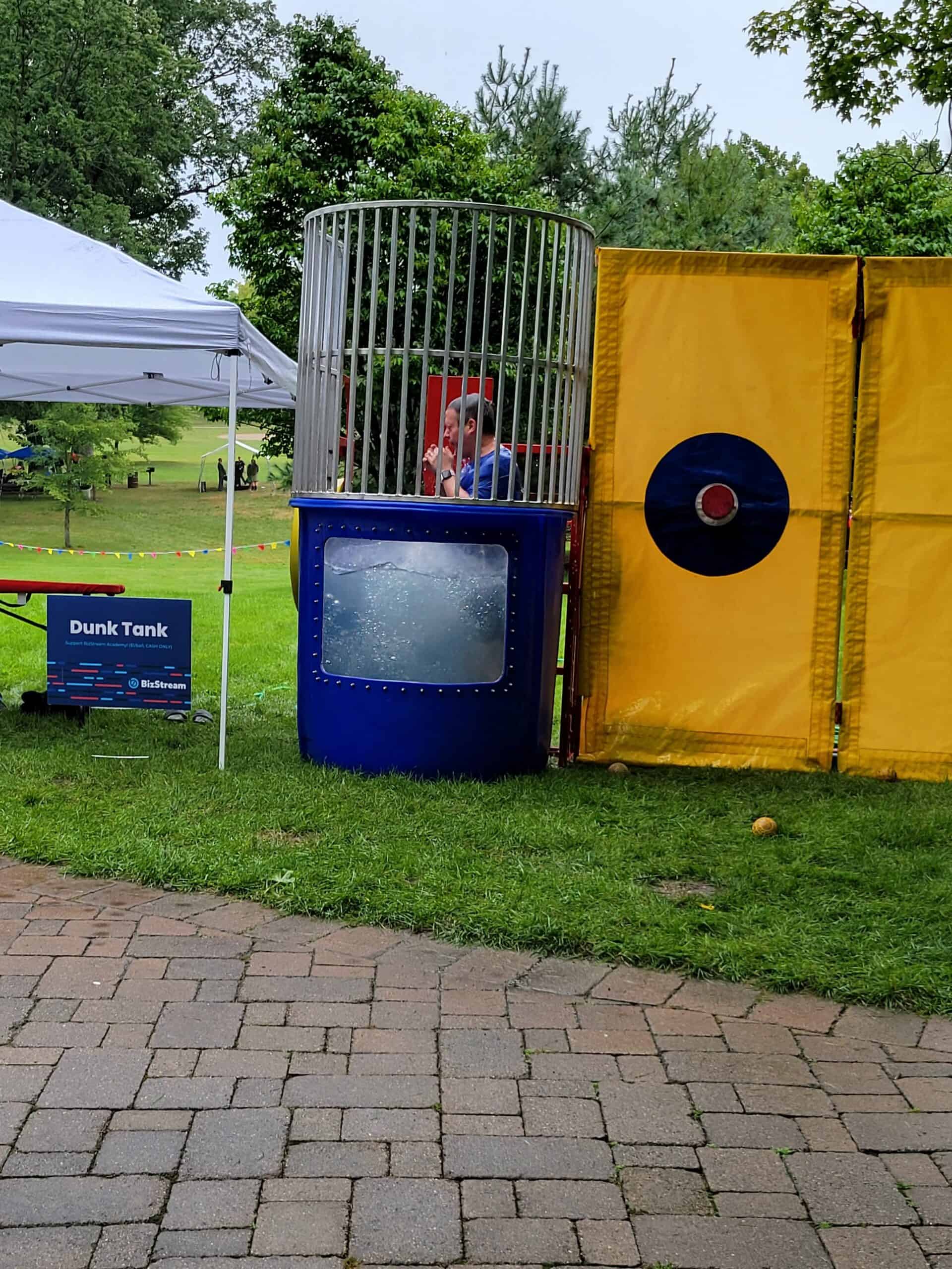 Person falling into a dunk tank