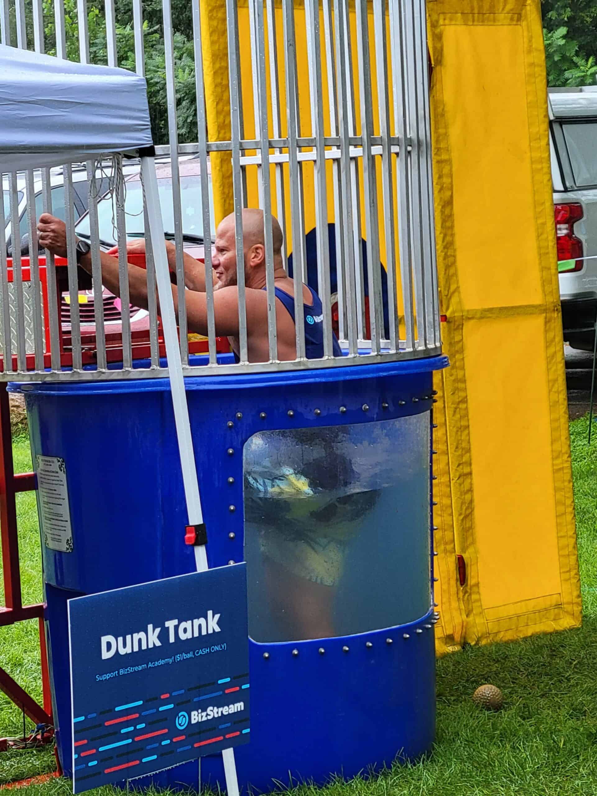Person falling into a dunk tank