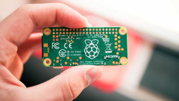 Raspberry Pi circuit board held in someone's hand