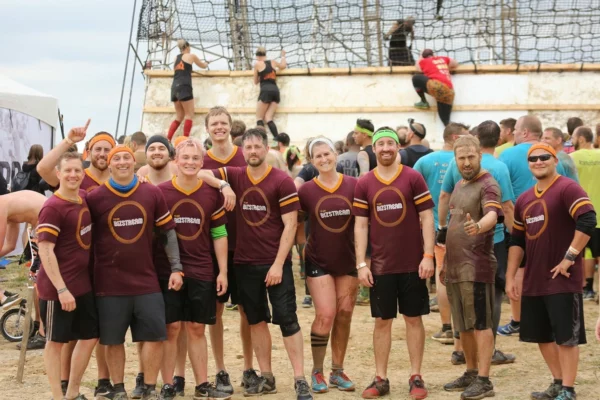 Group of BizStream team members at Tough Mudder