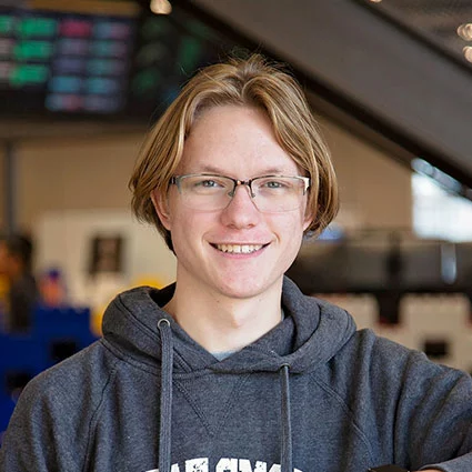 Guy posing in a hoodie