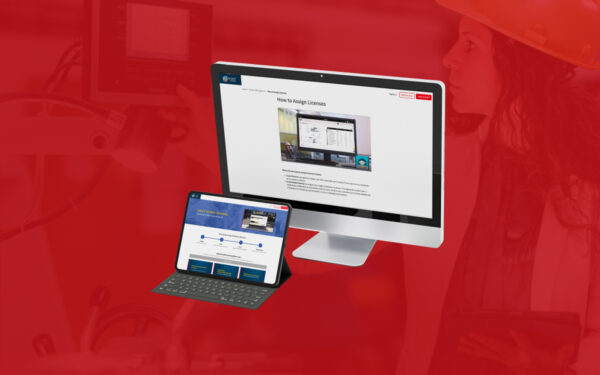 Overlay image combining a manufacturing scene with floating digital devices. A computer monitor displays a tutorial titled 'How to Assign Licenses' in the Enact system, while a tablet shows the Guided Learning Center homepage. The red background features a faded image of a woman in a hard hat working with machinery.