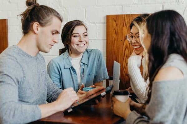 Four people in a meeting