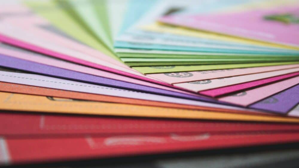 A close up of many different colored papers photo