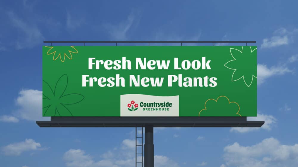 Countryside Greenhouse billboard mock-up with the phrase, "Fresh New Look, Fresh New Plants"