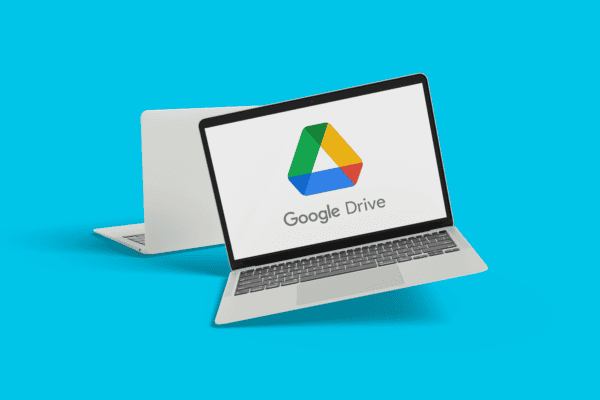 Laptop showing Google Drive logo on blue background