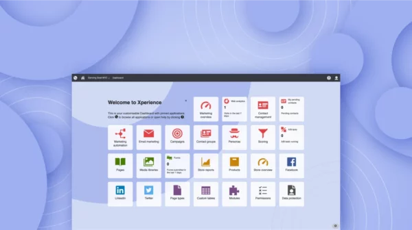 The image showcases the Kentico Xperience dashboard with a customizable interface. The dashboard is titled "Welcome to Xperience" and displays various application icons in a grid layout, including "Marketing automation," "Email marketing," "Pages," "Media libraries," "Facebook," and more. Above the grid, there's a navigation bar with the title "Dancing Goat MVC," and in the background, there is a soft purple and blue gradient with circular ripple designs, creating a modern and clean aesthetic.