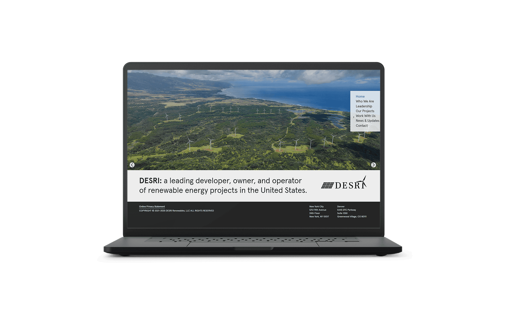 Laptop displaying DESRI website homepage featuring aerial view of a wind farm and text stating DESRI is a leading developer, owner, and operator of renewable energy projects in the United States