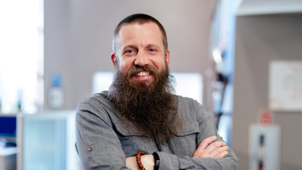 Josh Trench standing in the BizStream office