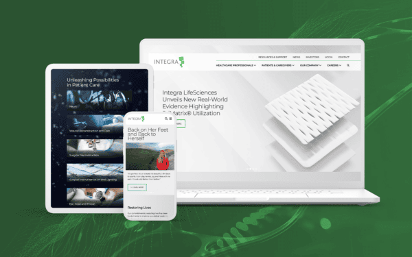 Phone, tablet, and laptop devices showcasing pages from the Integra website