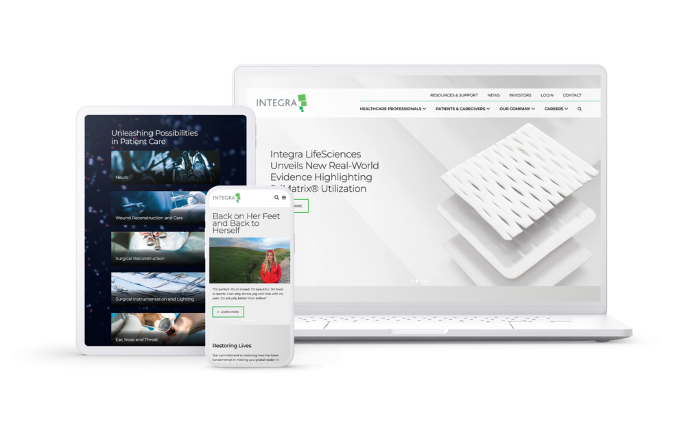 Phone, tablet, and laptop devices showcasing pages from the Integra website