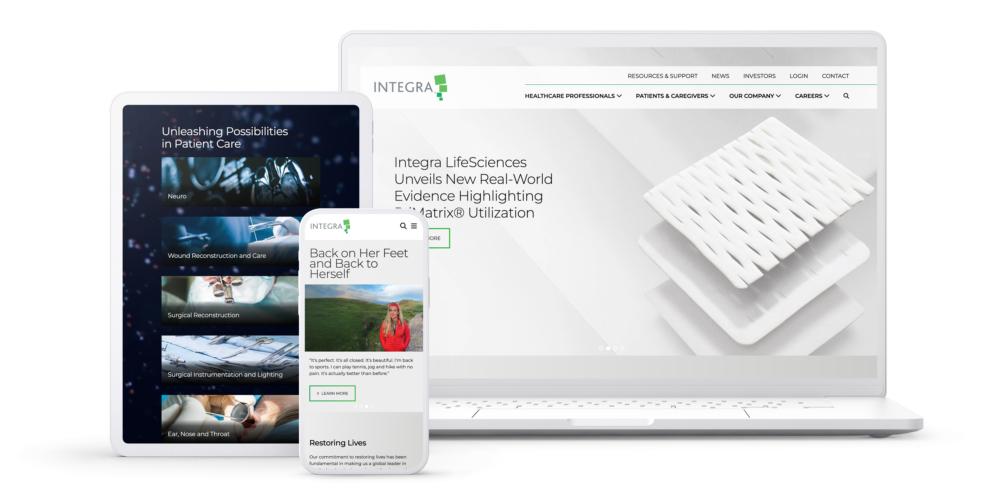 Phone, tablet, and laptop devices showcasing pages from the Integra website