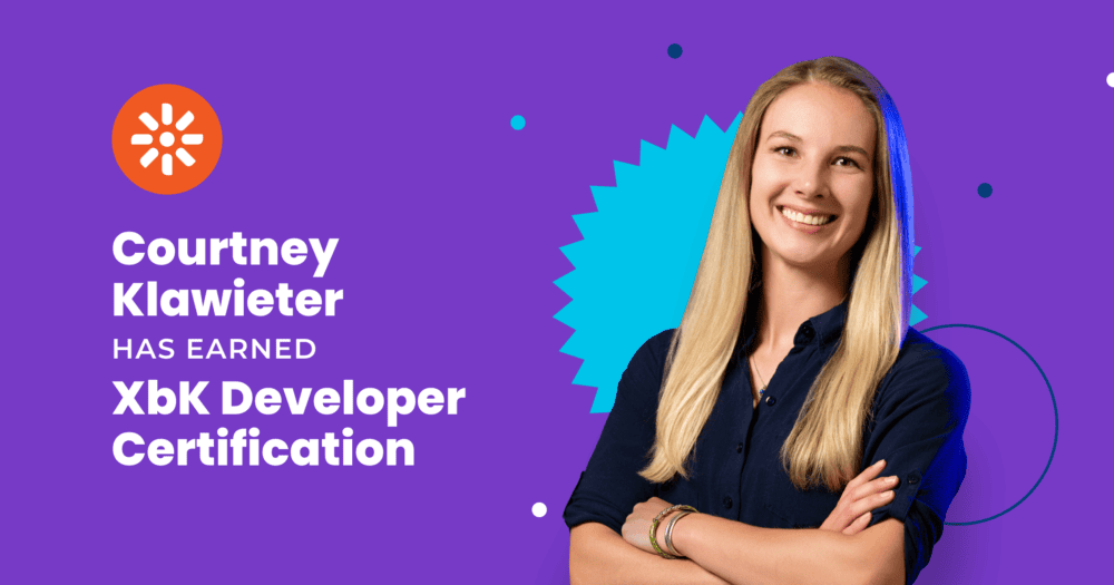 Courtney Klawieter smiling with arms crossed next to the Kentico logo and the text “Courtney Klawieter has earned XbK Developer Certification.”