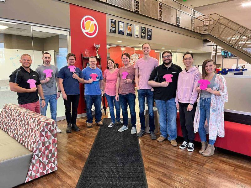 group of people wearing pink for international day of pink